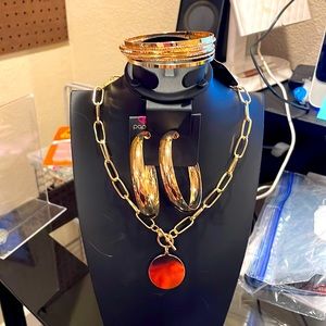 Gold neckless-with bangle brackets-hoop earrings. This is a perfect set.